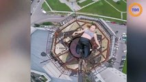 Une danseuse de pole dance fait une performance sur l’antenne d’un gratte-ciel !