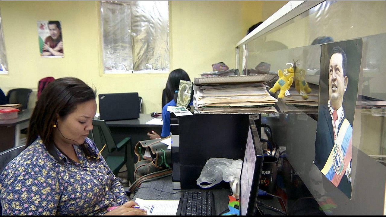 Despite hardships, small core still backs Venezuela's Maduro