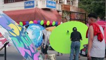 Graffiti Artists Spray Umbrellas