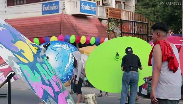 Graffiti Artists Spray Umbrellas