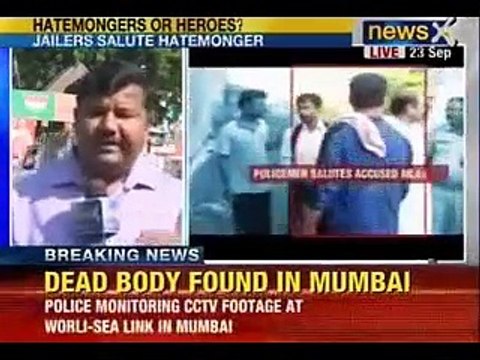 Muzaffarnagar Riots _ Policemen salute hatemongers Sangeet Som and Suresh Rana