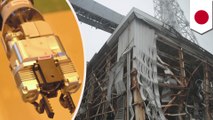 Japan utility uses robot to make 1st contact with Fukushima fuel