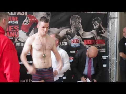SEAN McGLINCHEY STEPS ON THE SCALE UNDER WATCHFUL EYE OF TRAINER GLENN McCORY / BATTLE OF BELFAST