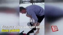 Donmuş nehre atlayan adam buza çakıldı