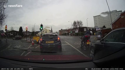 Heart-stopping moment T-boned car spins into lamppost in Stockport, England