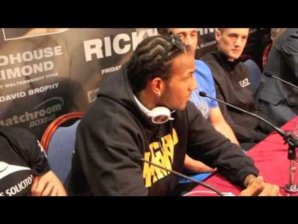 STEPHEN SIMMONS CONFRONTS WADI CAMACHO & SITS IN FRONT OF HIM IN MIDDLE OF PRESS CONFERENCE