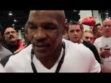 IRON MIKE TYSON SIGNING GLOVES AND HAVING PICTURES WITH FANS @ BOXING EXPO