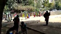 Kids playing in the park. This is a lovely scene and the light is amazing. Just a great video and snapshot of indian life.