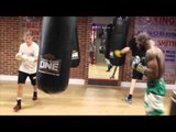 FORMER PRIZEFIGHTER CHAMPION UNDEFEATED LARRY EKUNDAYO WORKS OUT ON THE HEAVYBAG