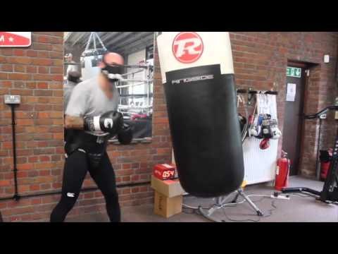 KEVIN MITCHELL SMASHES THE HEAVYBAG WHILE WEARING HIGH INTESITY MASK / iFL TV