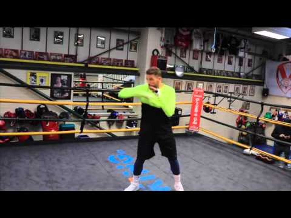 BILLY JOE SAUNDERS MOVING ABOUT & WARMING UP UNDER THE WATCHFUL EYE OF JIMMY TIBBS / LEE v SAUNDERS