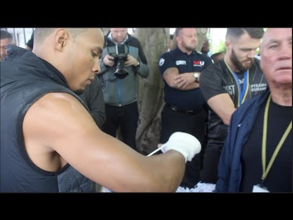 CHRIS EUBANK JR WRAPS HIS HANDS W/ RONNIE DAVIS UNDER MONOCLED EYE OF CHRIS EUBANK SR *ENGLISH*