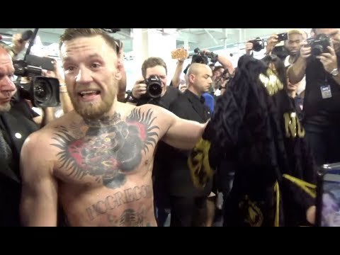 CONOR McGREGOR SHOWS OFF CUSTOM MADE VERSACE ROBE - GIVEN BY DONATELLA VERSACE
