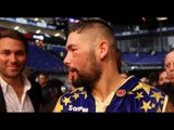 EDDIE HEARN APPEARS TO BE MIGHTILY RELIEVED THAT TONY BELLEW EMBRACED HIM AFTER BEATING HAYE