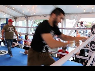 FAZED? -ARTUR BETERBIEV PRETENDS TO JUMP OUT OF RING - AS CALLUM JOHNSON FANS TRY TO RATTLE HIM