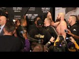 TYSON FURY GOES CRAZY & REMOVES HIS SHIRT, ATTEMPTS TO GO FOR WILDER IN FIERY HEAD TO HEAD