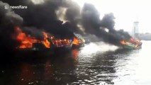 Fishing fleet completely destroyed in harbour fire in Indonesia