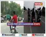 Bikers perform dangerous stunts