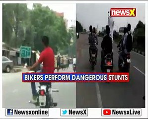 Bikers perform dangerous stunts