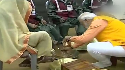 PM Modi washes the feet of sanitation workers in Prayagraj