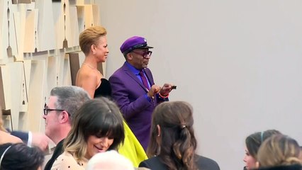 Spike Lee and his wife on the Oscars' red carpet