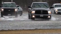 Ontario's main roads swallowed by fast moving rivers during storm surge