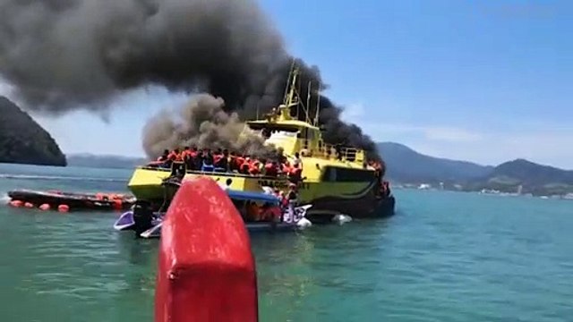 Tourists Rescued From Burning Boat