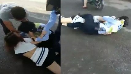 Kadın polis, durdurduğu sürücünün eşi ile saç baş birbirine girdi