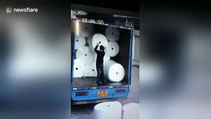 Worker in China nearly consumed by huge fire that bursts out of cotton yarn