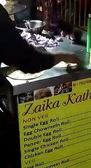 chopping skill and egg roll in a market stall