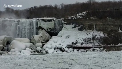 Broken ice from Lake Erie partially blocks Niagara Falls