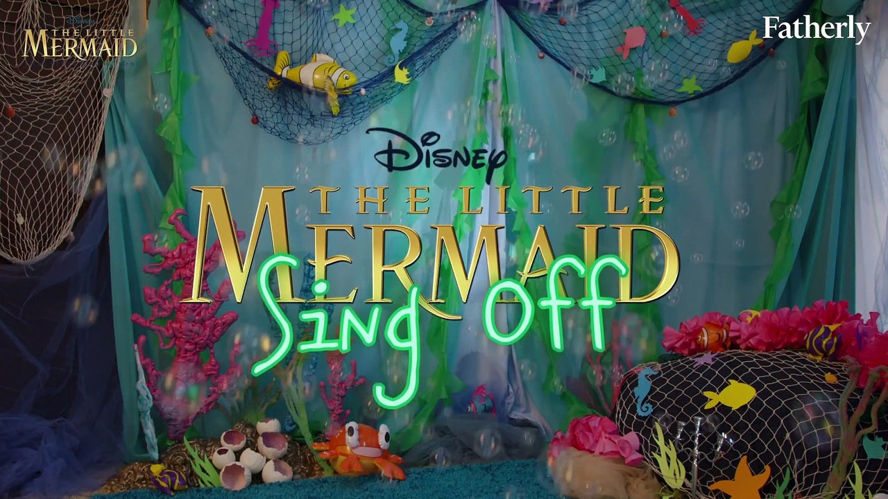 Watch These Dads Hold a “Little Mermaid” Sing Off!