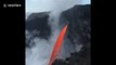 Spectacular lava waterfall filmed flowing into Pacific Ocean in Hawaii