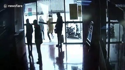 Hospital door falls off when opened, hitting passing woman