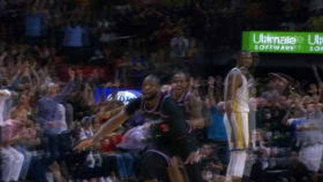 Wade's amazing buzzer-beater lifts Heat past Warriors