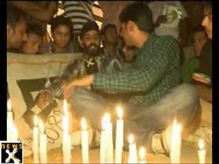 Jubilation, candle light march at India Gate after Anna's victory