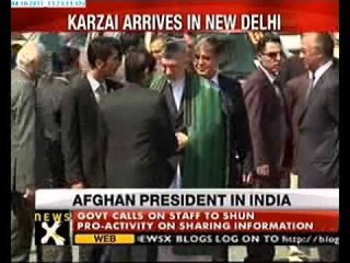 President Hamid Karzai arrives in India