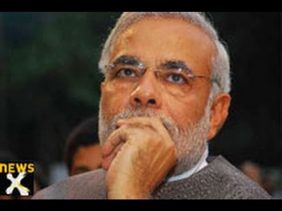 Gujarat Congress distributes leaflets praising...