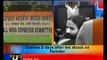 Ramdev supporters throw black ink on Sonia's poster