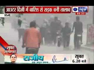 India News : Roads flooded, traffic hit as heavy rain lashes Delhi