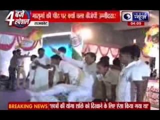 Mohan Kundariya walks over school childrens
