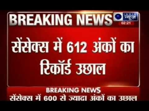 Sensex surges 612 points to hit new record high