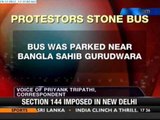 Protestors stone bus with tinted glasses - NewsX