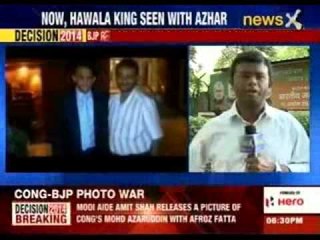 BJP releases photograph of Afroz Phatta with Azhar