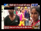 Girl slapping man for eve teasing on Delhi metro train