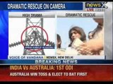 NewsX: Women rescued from high-tension electric tower