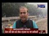 Garbage Piles up on east Delhi roads 'sanitation workers on strike'