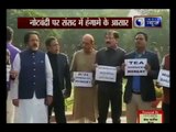 TMC protests against demonetisation in front of Gandhi statue in Parliament in Delhi