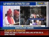 MP Minister Kailash Vijayvargiya distributes money, dares poll panel - NewsX