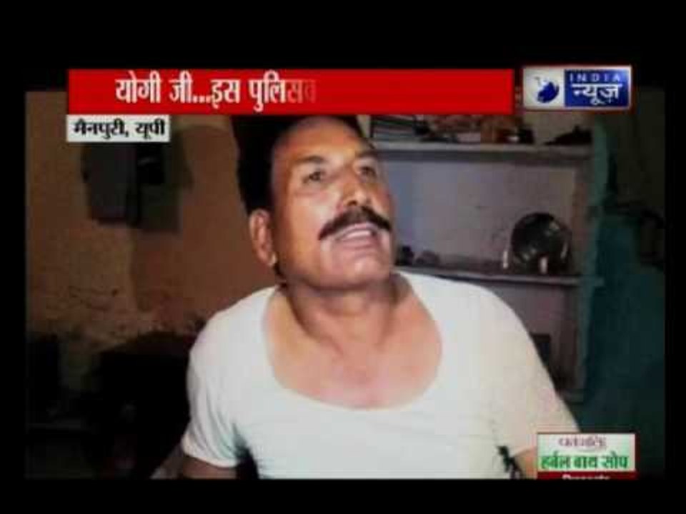 Policemen teasing a woman in Police Station in Mainpuri, UP